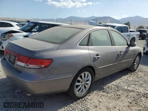 ✅ 2006 Hyundai Azera SE • VIN: KMHFC46F26A097236 • Лот: 65162185. Размещён на Copart с пробегом 125 233 миль миль. Получите бесплатный доступ к архиву аукционных продаж из США и посмотрите подробный отчёт об истории автомобиля на DreamBid. Изображение 3.