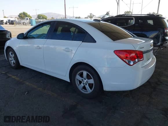 2016 Chevrolet Cruze LT z VIN 1G1PE5SB9G7224373, wystawiony jako IAAI lot #43316598 z przebiegiem 102 201 mil mil oraz . Historia ofert i sprzedaży dostępna na DreamBid. Obrazek 3.