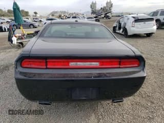 ✅ 2013 Dodge Challenger SXT • VIN: 2C3CDYAG7DH724513 • Lot: 82443884. Wystawiony na Copart z przebiegiem 150 505 mil. Bezpłatny archiwum sprzedaży aukcyjnych z USA i szczegółowy raport historii pojazdu na DreamBid. Zdjęcie 6.