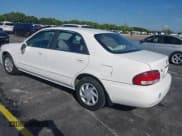 ✅ 1999 Mazda 626 ES • VIN: 1YVGF22C4X5841892 • Lot: 41678373. Listed on IAAI with 66,981 mi. Free auction sales archive from the USA and detailed vehicle history report at DreamBid. Image 3.