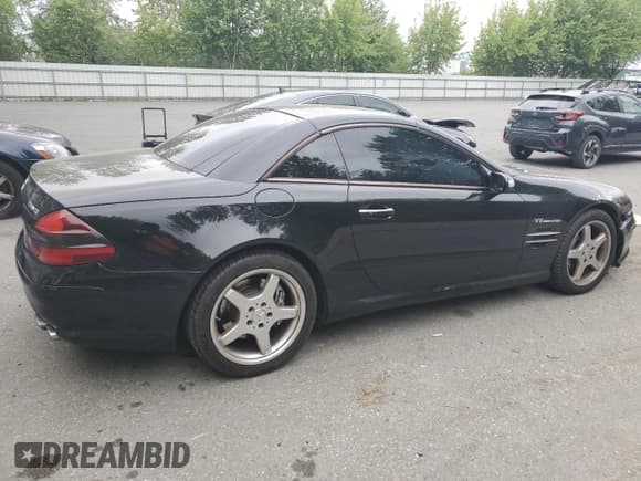 ✅ 2004 Mercedes-Benz SL 55/63 AMG • VIN: WDBSK74F24F076539 • Лот: 60300045. Опубликован ранее на Copart с пробегом 102 950 миль. Бесплатный доступ к архиву аукционных продаж из США и подробный отчёт об истории автомобиля на DreamBid. Изображение 3.