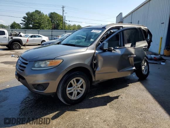 ✅ 2012 Hyundai Santa Fe GLS • VIN: 5XYZG3AB2CG135810 • Lot: 72519744. Listed on Copart with 137,627 mi. Free auction sales archive from the USA and detailed vehicle history report at DreamBid. Image 1.