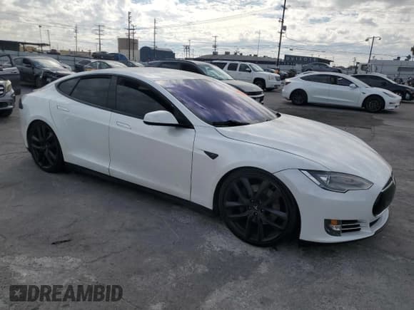 ✅ 2012 Tesla Model S Performance • VIN: 5YJSA1DP6CFP01473 • Lot: 92905865. Listed on Copart with Not provided. Free auction sales archive from the USA and detailed vehicle history report at DreamBid. Image 4.