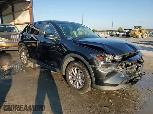 ✅ 2023 Mazda CX-5 S Carbon Edition • VIN: JM3KFBCM3P0189133 • Lot: 93620625. Listed on Copart with 56,552 mi. Free auction sales archive from the USA and detailed vehicle history report at DreamBid. Image 14.