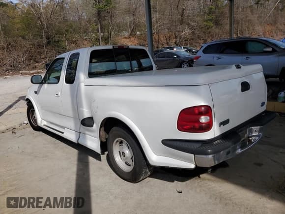 ✅ 1997 Ford F-150 • VIN: 1FTDX0766VKA86983 • Lot: 50896215. Listed on Copart with 214,746 mi. Free auction sales archive from the USA and detailed vehicle history report at DreamBid. Image 2.