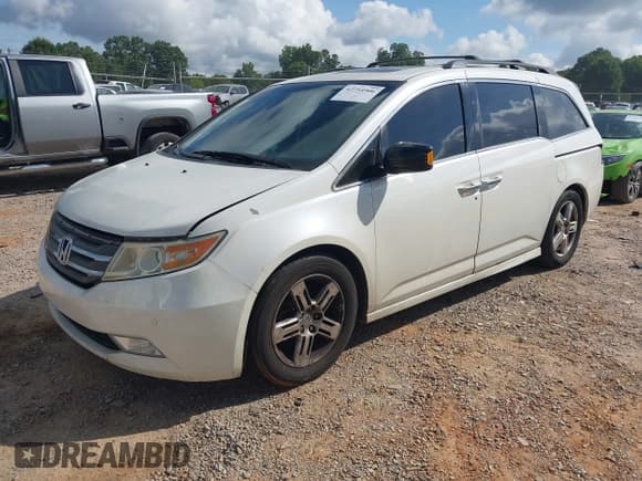 ✅ 2013 Honda Odyssey Touring • VIN: 5FNRL5H97DB012667 • Lot: 42754906. Listed on IAAI with 212,445 mi. Free auction sales archive from the USA and detailed vehicle history report at DreamBid. Image 2.