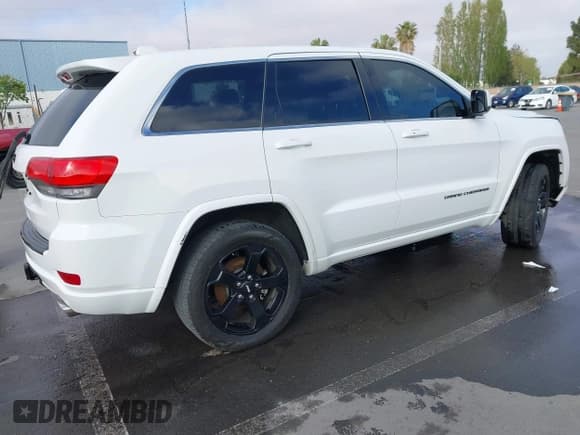 ✅ 2015 Jeep Grand Cherokee Laredo • VIN: 1C4RJEAGXFC668957 • Lot: 42071646. Wystawiony na IAAI z przebiegiem 129 508 mil. Bezpłatny archiwum sprzedaży aukcyjnych z USA i szczegółowy raport historii pojazdu na DreamBid. Zdjęcie 4.