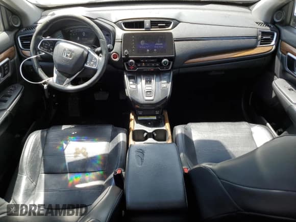 ✅ 2020 Honda CR-V Touring • VIN: 7FART6H93LE013954 • Лот: 56970555. Опубликован ранее на Copart с пробегом 134 931 миль. Бесплатный доступ к архиву аукционных продаж из США и подробный отчёт об истории автомобиля на DreamBid. Изображение 8.