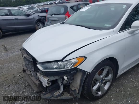 ✅ 2016 Ford Fusion SE • VIN: 3FA6P0H71GR162985 • Lot: 42347539. Listed on IAAI with 330,641 mi. Free auction sales archive from the USA and detailed vehicle history report at DreamBid. Image 19.