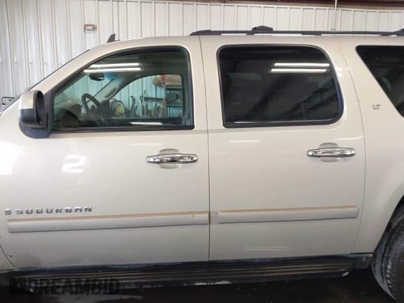 ✅ 2007 Chevrolet Suburban LT • VIN: 3GNFK16337G143209 • Lot: 42791126. Listed on IAAI with 275,673 mi. Free auction sales archive from the USA and detailed vehicle history report at DreamBid. Image 14.