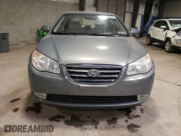 2009 Hyundai Elantra GLS z VIN KMHDU46D79U757051, wystawiony jako Copart lot #60498574 z przebiegiem 121 544 mil mil oraz Szkoda całkowita • Salvage title. Historia ofert i sprzedaży dostępna na DreamBid. Obrazek 5.