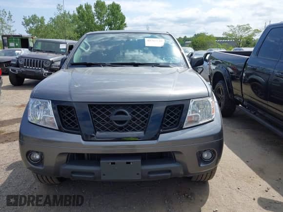 2020 Nissan Frontier SV with VIN 1N6ED0EB4LN726548, listed as a IAAI auction lot 42767637 with 64,100 mi miles and . Bid and sale history available at DreamBid. Image 12.