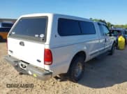 ✅ 1999 Ford F-250 XL • VIN: 1FTNX20L5XEC55084 • Lot: 42050064. Listed on IAAI with 135,884 mi. Free auction sales archive from the USA and detailed vehicle history report at DreamBid. Image 4.