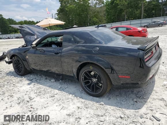 ✅ 2023 Dodge Challenger R/T Scat Pack Widebody • VIN: 2C3CDZFJ1PH684539 • Lot: 58631144. Wystawiony na Copart z przebiegiem 1 374 mil. Bezpłatny archiwum sprzedaży aukcyjnych z USA i szczegółowy raport historii pojazdu na DreamBid. Zdjęcie 2.