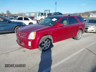 ✅ 2009 Cadillac SRX AWD • VIN: 1GYEE437490100987 • Lot: 43784620. Wystawiony na IAAI z przebiegiem 232 947 mil. Bezpłatny archiwum sprzedaży aukcyjnych z USA i szczegółowy raport historii pojazdu na DreamBid. Zdjęcie 2.