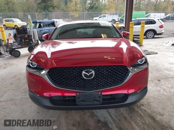 ✅ 2024 Mazda CX-30 S Carbon Edition • VIN: 3MVDMBCM6RM642036 • Лот: 43682381. Опубликован ранее на IAAI с пробегом 12 732 миль. Бесплатный доступ к архиву аукционных продаж из США и подробный отчёт об истории автомобиля на DreamBid. Изображение 13.