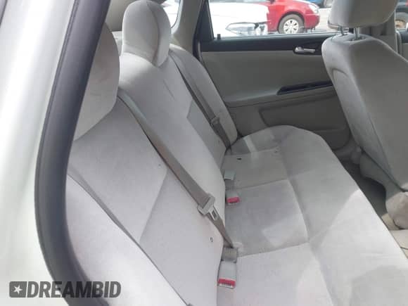 2016 Chevrolet Impala LT with VIN 2G1WB5E3XG1127706, listed as a IAAI auction lot 43407642 with 145,236 mi miles and . Bid and sale history available at DreamBid. Image 8.