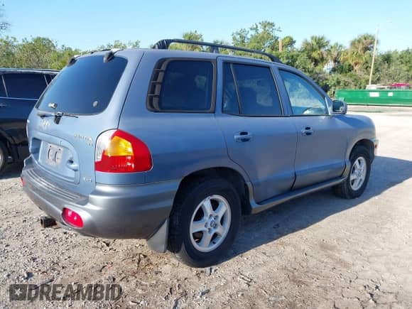 ✅ 2003 Hyundai Santa Fe GLS • VIN: KM8SC73D33U469955 • Лот: 41989360. Размещён на IAAI с пробегом 66 798 миль миль. Получите бесплатный доступ к архиву аукционных продаж из США и посмотрите подробный отчёт об истории автомобиля на DreamBid. Изображение 4.
