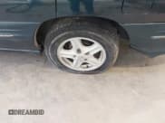 ✅ 1999 Pontiac Bonneville SE • VIN: 1G2HX52K0XH238196 • Лот: 42783319. Опубликован ранее на IAAI с пробегом 216 146 миль. Бесплатный доступ к архиву аукционных продаж из США и подробный отчёт об истории автомобиля на DreamBid. Изображение 6.