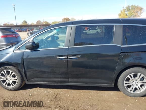 ✅ 2012 Honda Odyssey EX-L • VIN: 5FNRL5H60CB140575 • Lot: 43605156. Listed on IAAI with Not provided. Free auction sales archive from the USA and detailed vehicle history report at DreamBid. Image 14.