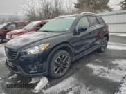 ✅ 2016 Mazda CX-5 Grand Touring • VIN: JM3KE4DY9G0886287 • Lot: 96258785. Wystawiony na Copart z przebiegiem 136 186 mil. Bezpłatny archiwum sprzedaży aukcyjnych z USA i szczegółowy raport historii pojazdu na DreamBid. Zdjęcie 1.