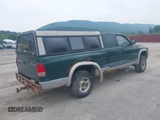 ✅ 1999 Dodge Dakota SLT • VIN: 1B7GG22X0XS104969 • Lot: 42493470. Wystawiony na IAAI z przebiegiem 160 019 mil. Bezpłatny archiwum sprzedaży aukcyjnych z USA i szczegółowy raport historii pojazdu na DreamBid. Zdjęcie 4.