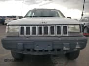 ✅ 1995 Jeep Grand Cherokee Laredo • VIN: 1J4GZ58Y6SC718918 • Лот: 72226394. Опубликован ранее на Copart с пробегом 212 670 миль. Бесплатный доступ к архиву аукционных продаж из США и подробный отчёт об истории автомобиля на DreamBid. Изображение 5.
