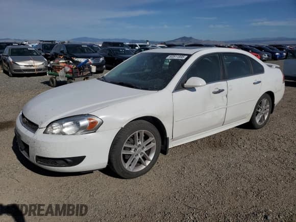 ✅ 2014 Chevrolet Impala LTZ • VIN: 2G1WC5E38E1167051 • Lot: 63511595. Listed on Copart with 145,133 mi. Free auction sales archive from the USA and detailed vehicle history report at DreamBid. Image 1.