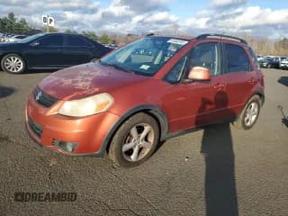 ✅ 2007 Suzuki SX4 • VIN: JS2YB413875107426 • Лот: 91083765. Опубликован ранее на Copart с пробегом 115 583 миль. Бесплатный доступ к архиву аукционных продаж из США и подробный отчёт об истории автомобиля на DreamBid. Изображение 1.