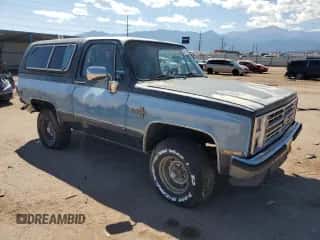 1987 Chevrolet Blazer z VIN 1GNEV18K7HF180306, wystawiony jako Copart lot #80914465 z przebiegiem 455 897 mil mil oraz Nie do naprawy • Non repairable. Historia ofert i sprzedaży dostępna na DreamBid. Obrazek 4.