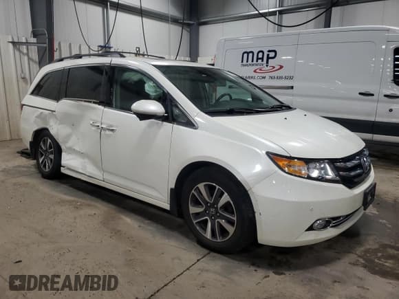 ✅ 2014 Honda Odyssey Touring • VIN: 5FNRL5H92EB024775 • Lot: 91608255. Listed on Copart with 167,473 mi. Free auction sales archive from the USA and detailed vehicle history report at DreamBid. Image 4.