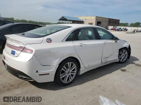 ✅ 2014 Lincoln MKZ Hybrid • VIN: 3LN6L2LU1ER814205 • Lot: 56635925. Wystawiony na Copart z przebiegiem 128 884 mil. Bezpłatny archiwum sprzedaży aukcyjnych z USA i szczegółowy raport historii pojazdu na DreamBid. Zdjęcie 3.