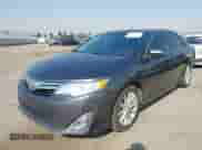 2013 Toyota Camry L with VIN 4T4BF1FK7DR297029, listed as a IAAI auction lot 43121416 with 200,854 mi miles and . Bid and sale history available at DreamBid. Image 2.