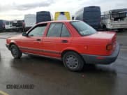 ✅ 1992 Nissan Sentra E • VIN: JN1EB31P1NU121278 • Lot: 84889294. Listed on Copart with 128,445 mi. Free auction sales archive from the USA and detailed vehicle history report at DreamBid. Image 2.