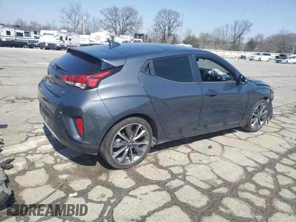 2020 Hyundai Veloster Premium с VIN KMHTG6AF6LU030076, выставлен на аукционе Copart как лот 48789745 с пробегом 92 848 миль миль и Списание • Salvage title. История ставок и продаж доступна на DreamBid. Изображение 3.