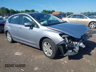 ✅ 2016 Subaru Impreza Premium • VIN: JF1GPAB65G8270778 • Lot: 42891616. Listed on IAAI with 77,071 mi. Free auction sales archive from the USA and detailed vehicle history report at DreamBid. Image 1.