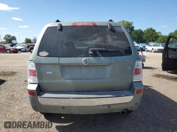✅ 2008 Mercury Mariner Premier • VIN: 4M2CU87148KJ49696 • Lot: 70355895. Wystawiony na Copart z przebiegiem 168 159 mil. Bezpłatny archiwum sprzedaży aukcyjnych z USA i szczegółowy raport historii pojazdu na DreamBid. Zdjęcie 6.