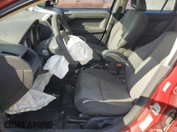 2009 Dodge Caliber SXT с VIN 1B3HB48A49D143686, выставлен на аукционе Copart как лот 72236454 с пробегом 301 971 миль миль и Списание • Salvage title. История ставок и продаж доступна на DreamBid. Изображение 7.