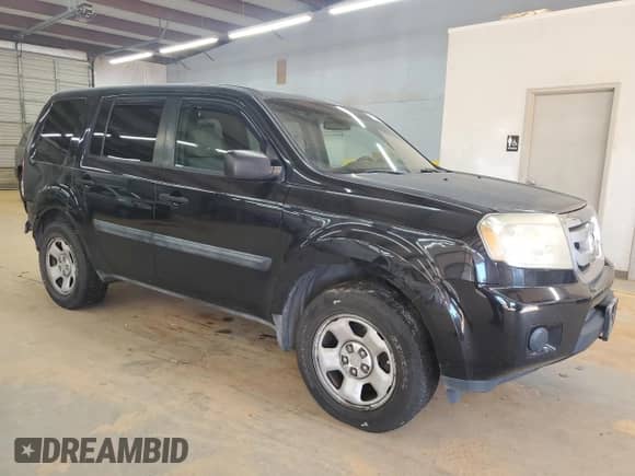2011 Honda Pilot LX with VIN 5FNYF3H20BB031813, listed as a Copart auction lot 82650315 with 279,751 mi miles and Salvage title. Bid and sale history available at DreamBid. Image 4.