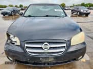 ✅ 2003 Nissan Maxima GLE • VIN: JN1DA31A63T432458 • Лот: 83938105. Опубликован ранее на Copart с пробегом 138 067 миль. Бесплатный доступ к архиву аукционных продаж из США и подробный отчёт об истории автомобиля на DreamBid. Изображение 5.