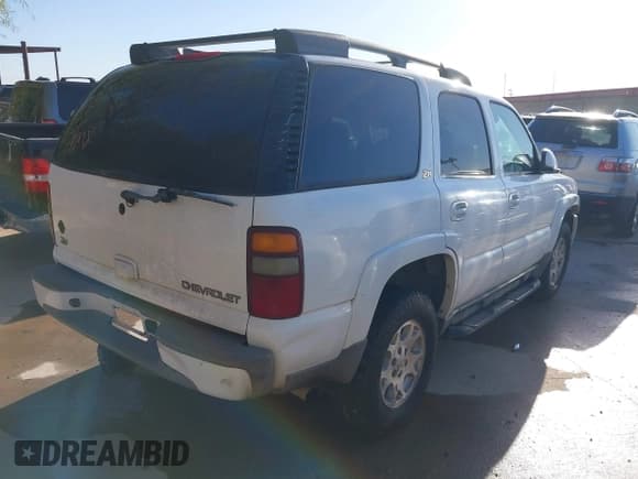 ✅ 2003 Chevrolet Tahoe Z71 • VIN: 1GNEK13Z13R215250 • Lot: 43487629. Listed on IAAI with Not provided. Free auction sales archive from the USA and detailed vehicle history report at DreamBid. Image 4.