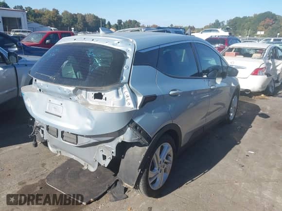 ✅ 2023 Chevrolet Bolt EV 1LT • VIN: 1G1FW6S07P4180386 • Lot: 43488676. Listed on IAAI with 32,179 mi. Free auction sales archive from the USA and detailed vehicle history report at DreamBid. Image 4.