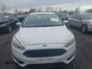 ✅ 2017 Ford Focus SE • VIN: 1FADP3F25HL216420 • Lot: 43594425. Listed on IAAI with 146,896 mi. Free auction sales archive from the USA and detailed vehicle history report at DreamBid. Image 13.