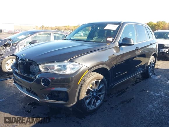 ✅ 2018 BMW X5 xDrive40e • VIN: 5UXKT0C51J0V98655 • Lot: 43532164. Listed on IAAI with 64,222 mi. Free auction sales archive from the USA and detailed vehicle history report at DreamBid. Image 2.