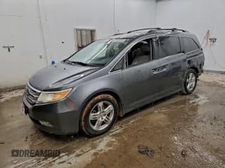 ✅ 2012 Honda Odyssey Touring • VIN: 5FNRL5H96CB130580 • Lot: 95648755. Listed on Copart with 226,387 mi. Free auction sales archive from the USA and detailed vehicle history report at DreamBid. Image 1.