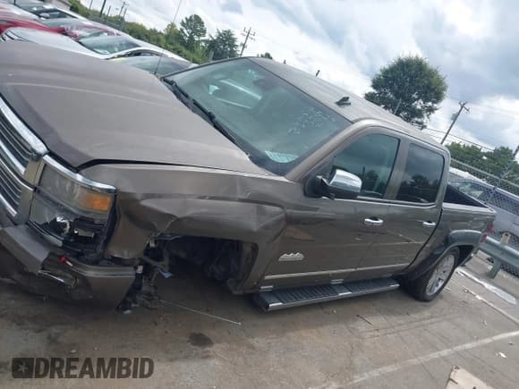 ✅ 2014 Chevrolet Silverado 1500 High Country • VIN: 3GCPCTEC7EG535811 • Lot: 43318821. Listed on IAAI with 170,885 mi. Free auction sales archive from the USA and detailed vehicle history report at DreamBid. Image 14.