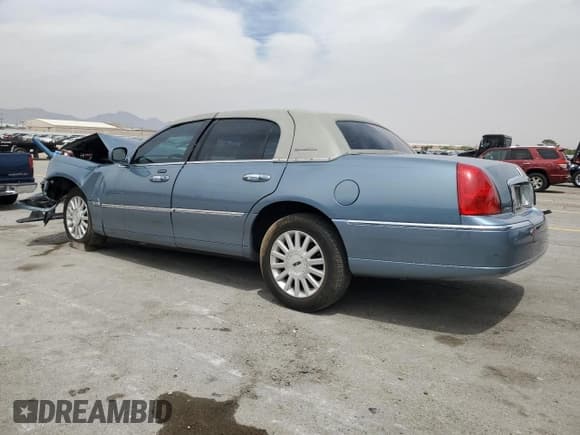✅ 2004 Lincoln Town Car Ultimate • VIN: 1LNHM83W34Y687080 • Lot: 67322785. Listed on Copart with 96,899 mi. Free auction sales archive from the USA and detailed vehicle history report at DreamBid. Image 2.