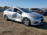 ✅ 2016 Chevrolet Cruze LS • VIN: 1G1BC5SM2G7275103 • Lot: 87014805. Listed on Copart with 142,893 mi. Free auction sales archive from the USA and detailed vehicle history report at DreamBid. Image 4.