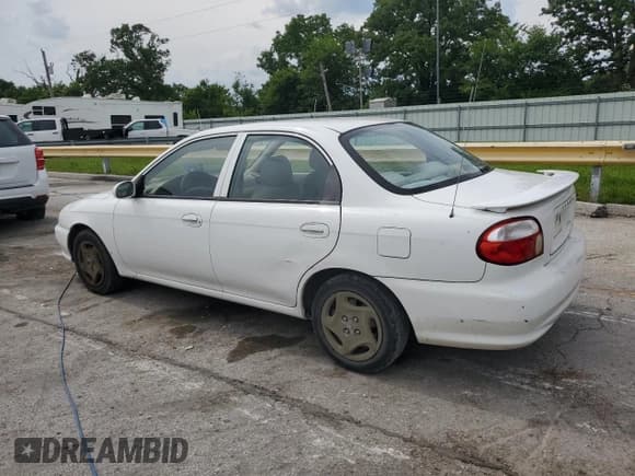 ✅ 2001 Kia Sephia • VIN: KNAFB121615073133 • Lot: 59884435. Wystawiony na Copart z przebiegiem 177 649 mil. Bezpłatny archiwum sprzedaży aukcyjnych z USA i szczegółowy raport historii pojazdu na DreamBid. Zdjęcie 2.