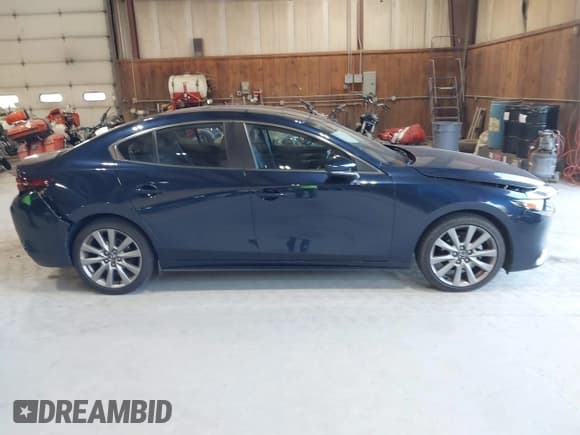 ✅ 2021 Mazda 3 Preferred • VIN: JM1BPBCL7M1334712 • Lot: 43160500. Listed on IAAI with 57,546 mi. Free auction sales archive from the USA and detailed vehicle history report at DreamBid. Image 13.